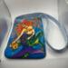 This shoulder bag has an inside zipper pocket and two slip pockets on the back. She and her little siste pouch are included in the price.